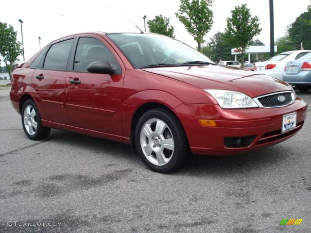2005 Focus ZX4 SES Sedan - Sangria Red Metallic / Dark Pebble/Light Pebble photo #8