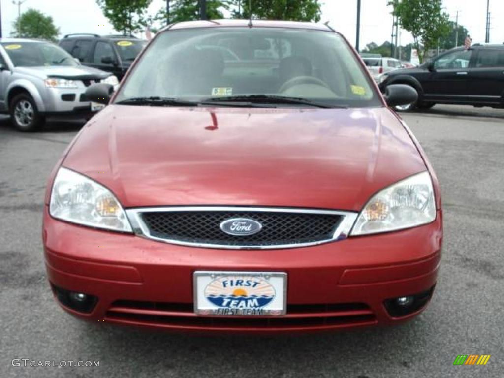 2005 Focus ZX4 SES Sedan - Sangria Red Metallic / Dark Pebble/Light Pebble photo #9