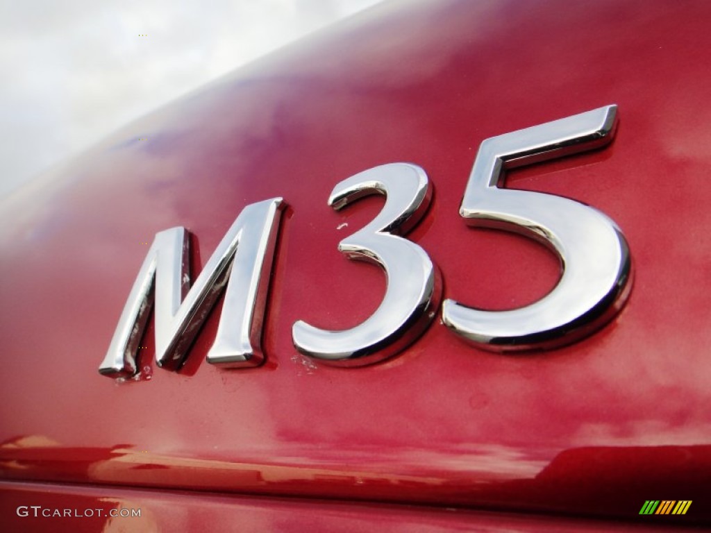 2006 M 35 Sport Sedan - Crimson Roulette Pearl / Wheat photo #19
