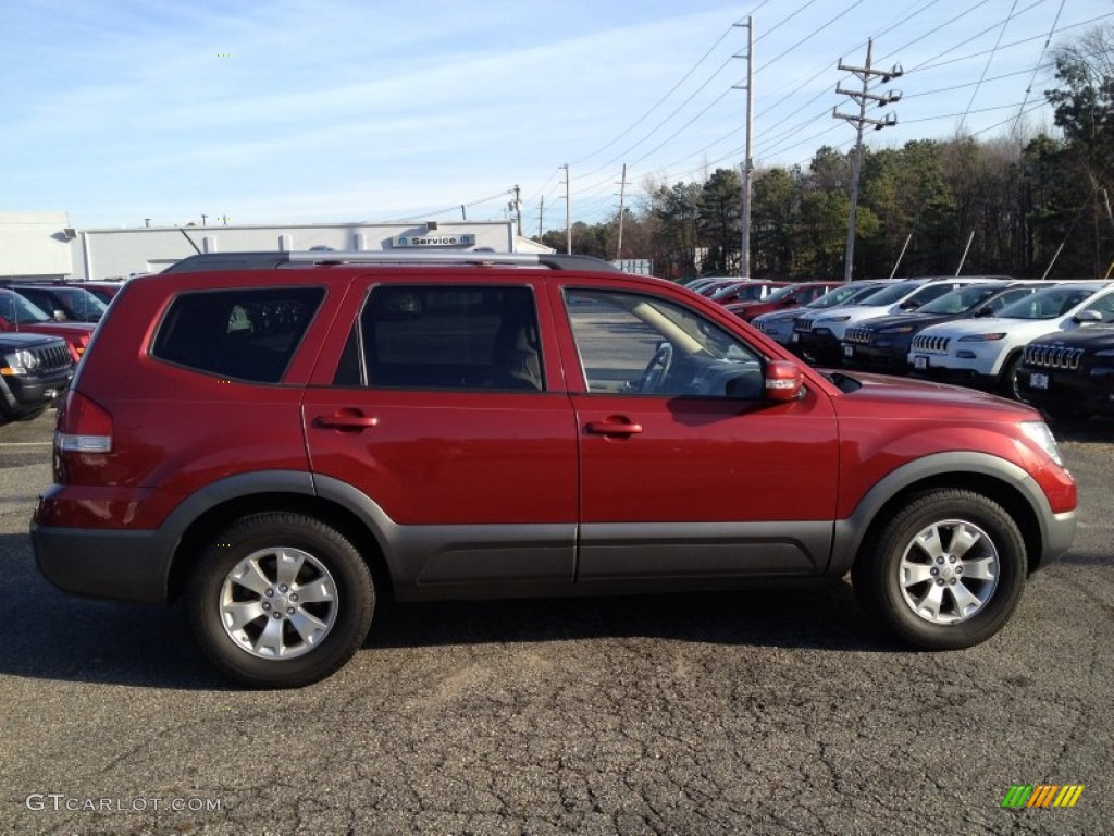 2009 Borrego LX V6 4x4 - Spicy Red / Beige photo #8