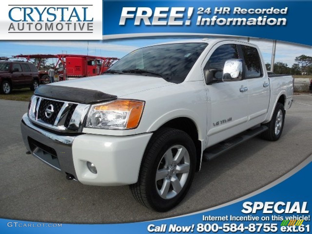 2011 Titan SL Crew Cab 4x4 - Blizzard White / Charcoal photo #1
