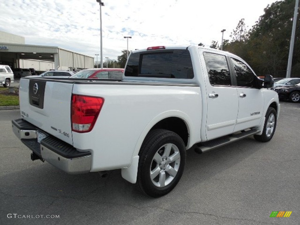 2011 Titan SL Crew Cab 4x4 - Blizzard White / Charcoal photo #9
