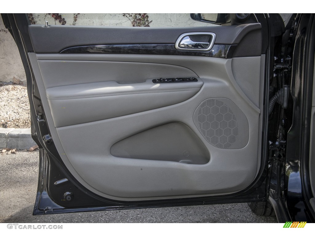 2011 Jeep Grand Cherokee Laredo X Package Dark Graystone/Medium Graystone Door Panel Photo #89522152