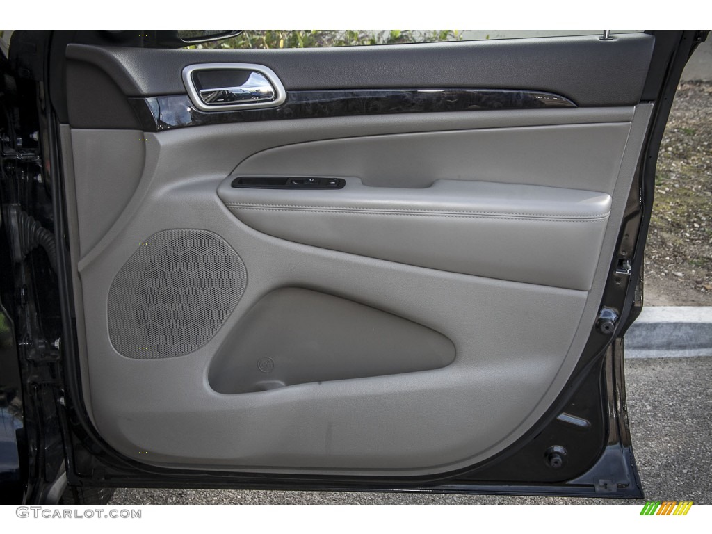 2011 Jeep Grand Cherokee Laredo X Package Dark Graystone/Medium Graystone Door Panel Photo #89522350