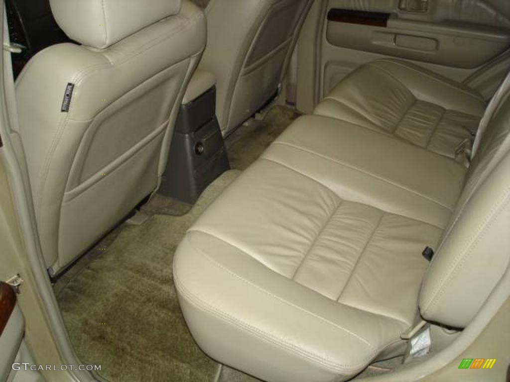 1999 QX4 4x4 - Tuscan Beige Metallic / Beige photo #11