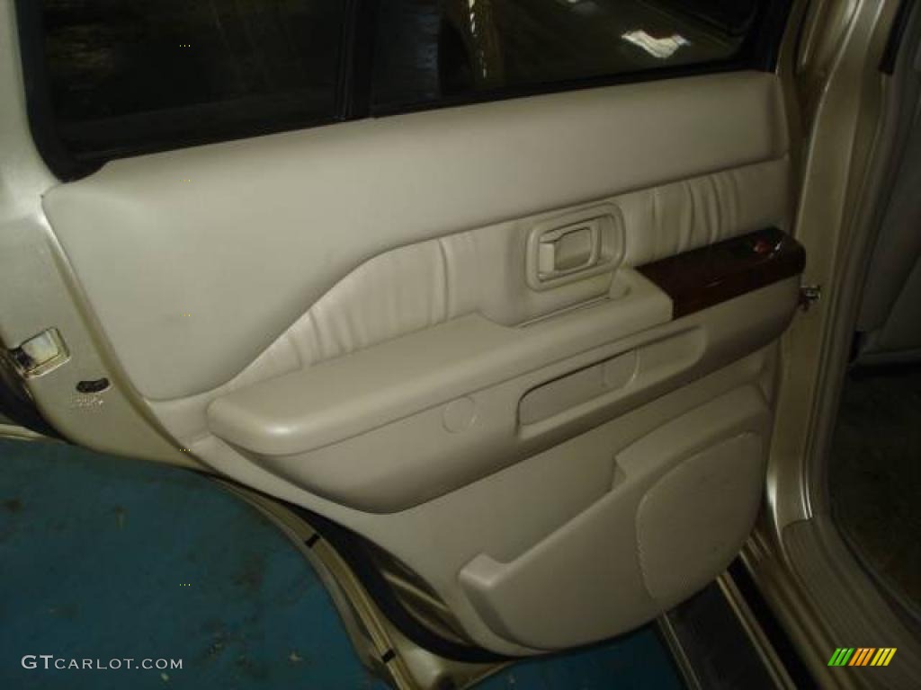 1999 QX4 4x4 - Tuscan Beige Metallic / Beige photo #13