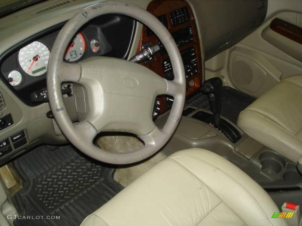 1999 QX4 4x4 - Tuscan Beige Metallic / Beige photo #15