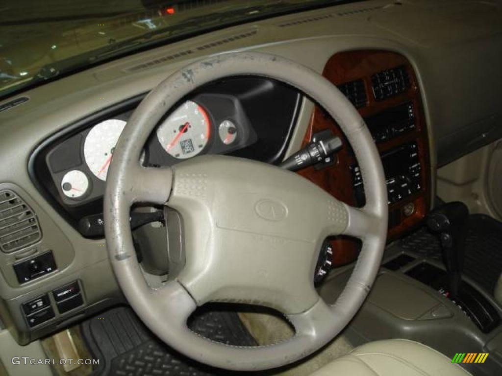1999 QX4 4x4 - Tuscan Beige Metallic / Beige photo #17