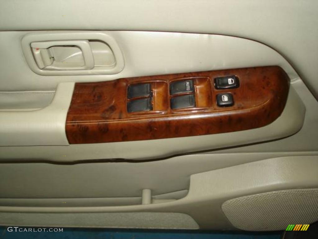 1999 QX4 4x4 - Tuscan Beige Metallic / Beige photo #19