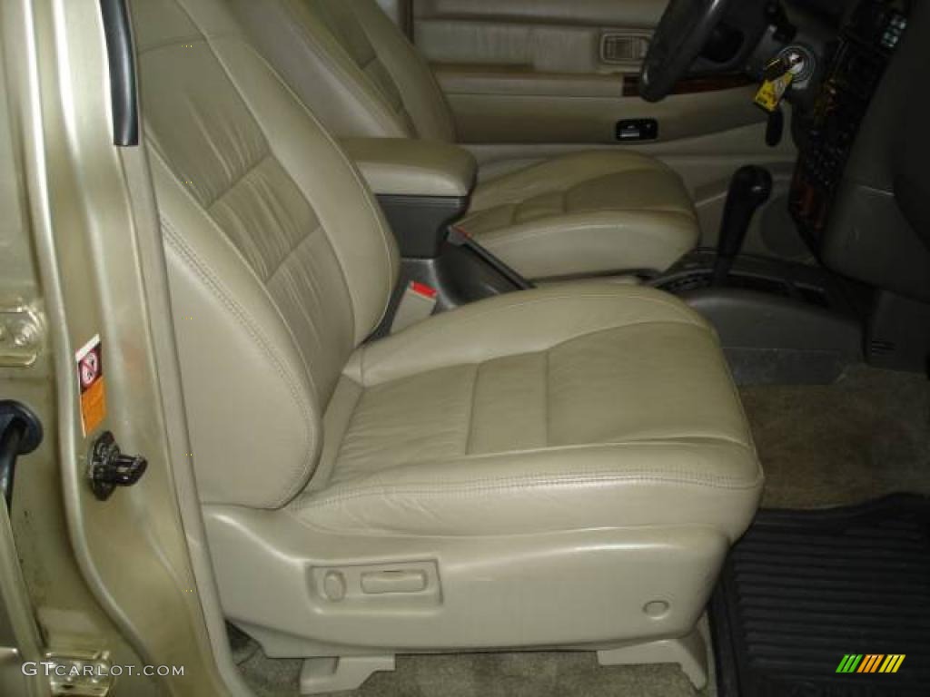 1999 QX4 4x4 - Tuscan Beige Metallic / Beige photo #31