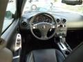 2010 Pontiac G6 Ebony Interior Dashboard Photo