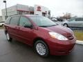 2010 Salsa Red Pearl Toyota Sienna LE  photo #1
