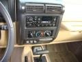 1999 Jeep Wrangler Camel/Dark Green Interior Controls Photo