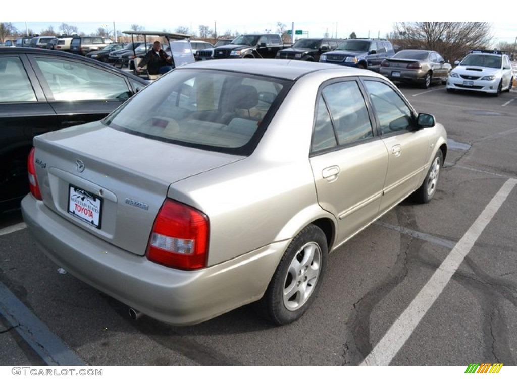 2002 Protege LX - Light Sandalwood Metallic / Beige photo #2
