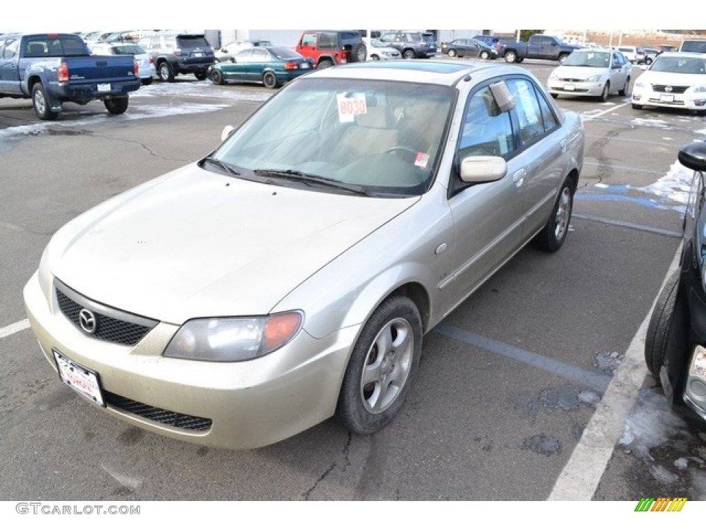 2002 Protege LX - Light Sandalwood Metallic / Beige photo #4