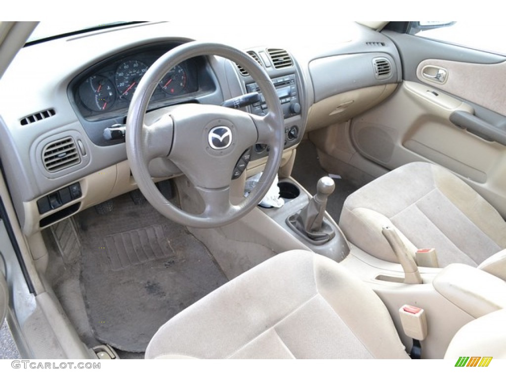 2002 Protege LX - Light Sandalwood Metallic / Beige photo #5