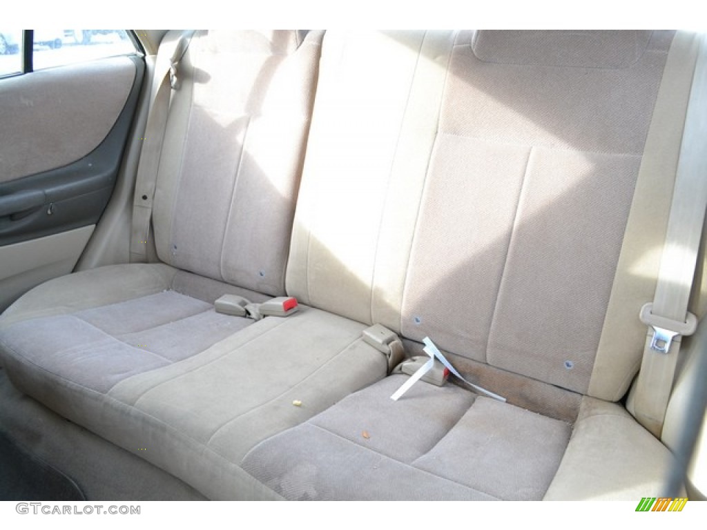 2002 Protege LX - Light Sandalwood Metallic / Beige photo #6