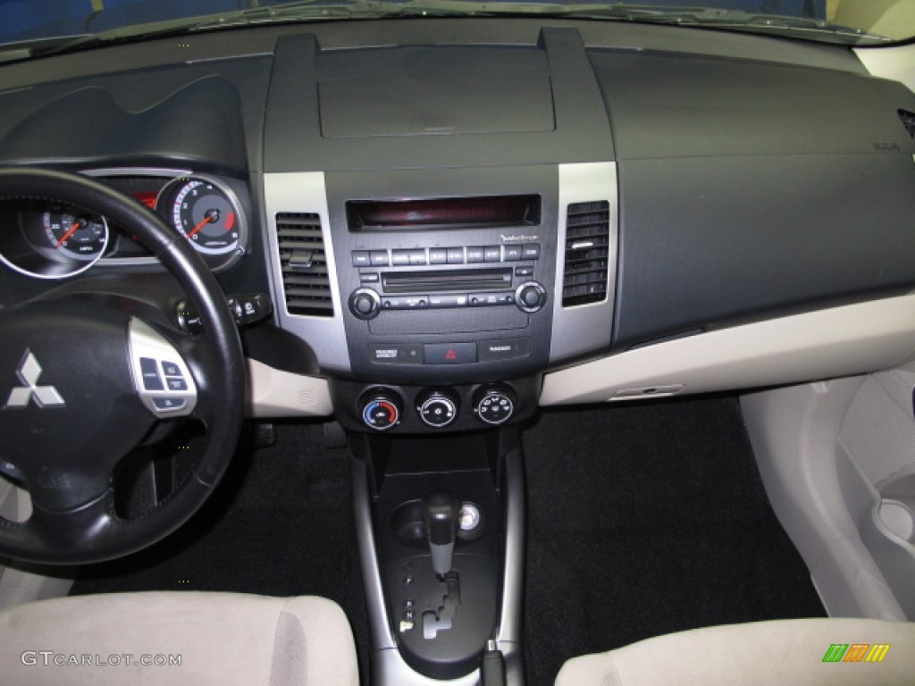 2007 Outlander LS 4WD - Deep Blue Metallic / Beige photo #24