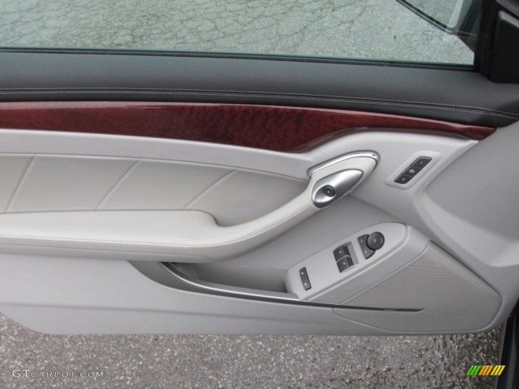 2011 Cadillac CTS 4 AWD Coupe Light Titanium/Ebony Door Panel Photo #89699685