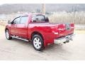 2008 Red Alert Nissan Titan LE Crew Cab 4x4  photo #3