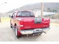 2008 Red Alert Nissan Titan LE Crew Cab 4x4  photo #4