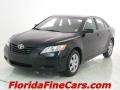 2009 Black Toyota Camry LE  photo #1