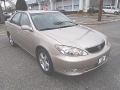 2006 Desert Sand Mica Toyota Camry SE  photo #3