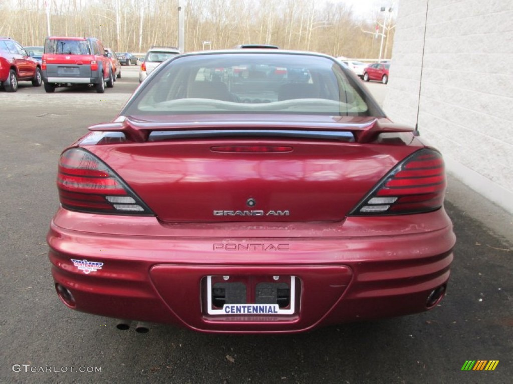2002 Grand Am SE Sedan - Redfire Metallic / Dark Taupe photo #5