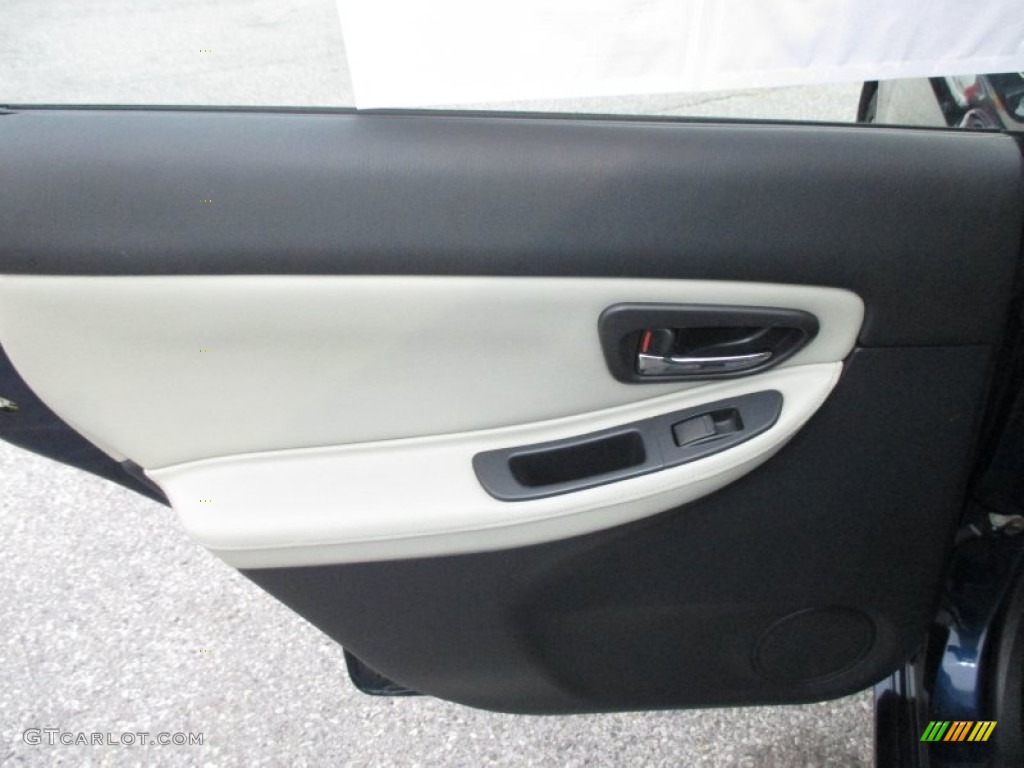 2005 Saab 9-2X Linear Wagon Black/Parchment Door Panel Photo #89921430