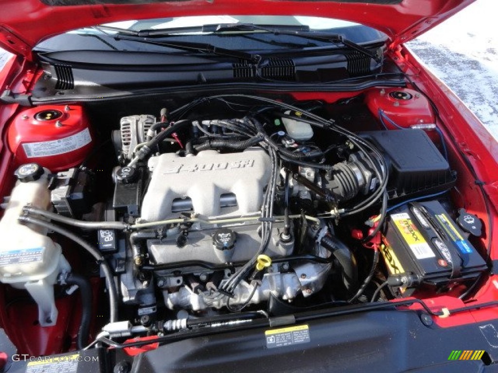 2004 Grand Am SE Sedan - Victory Red / Dark Taupe photo #10
