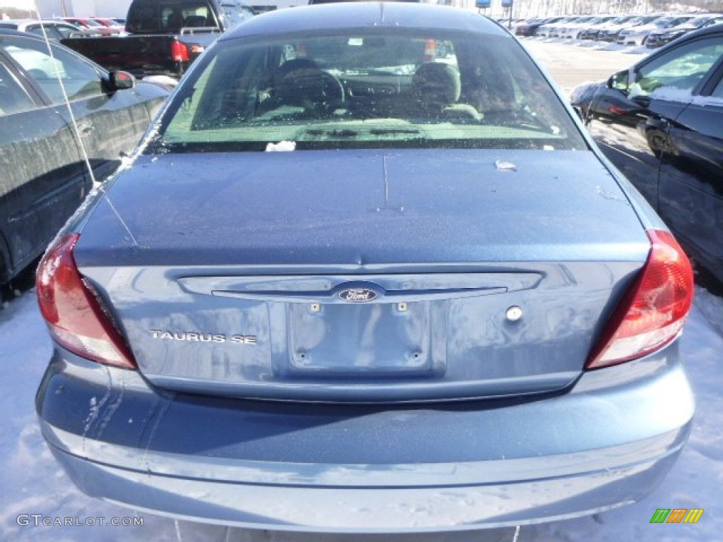 2004 Taurus SE Sedan - True Blue Metallic / Dark Charcoal photo #3
