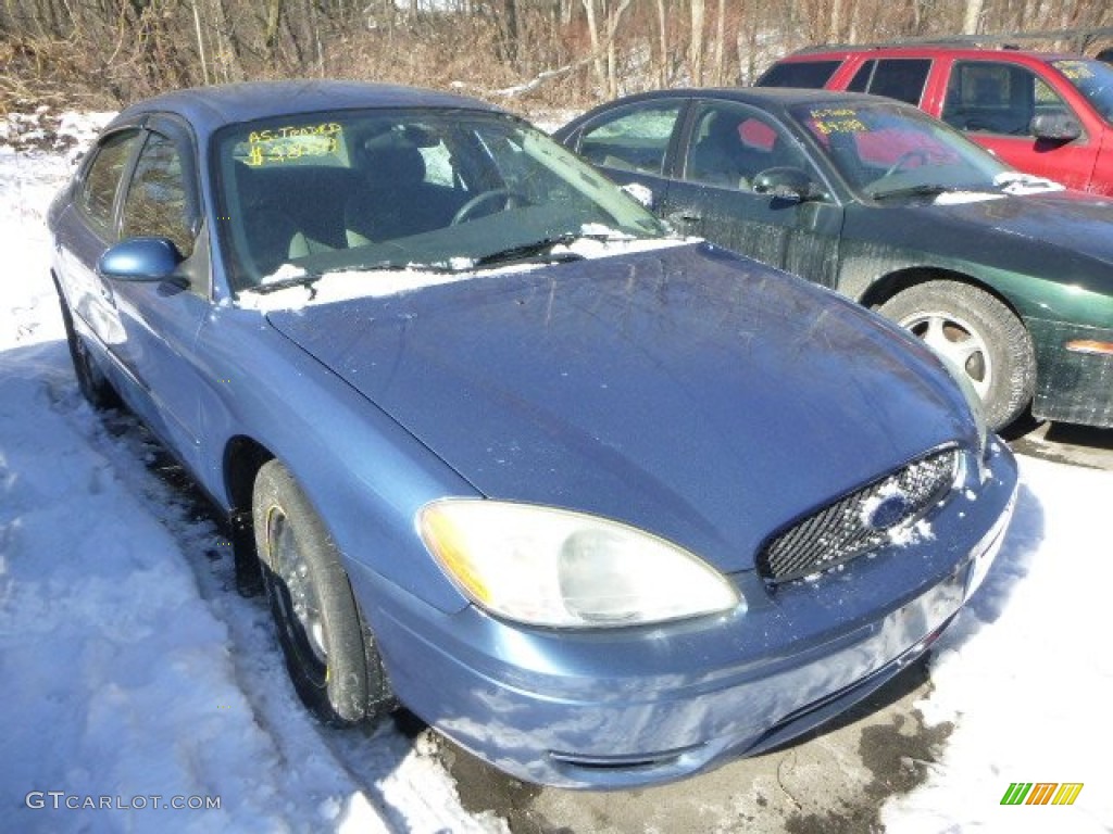 2004 Taurus SE Sedan - True Blue Metallic / Dark Charcoal photo #5