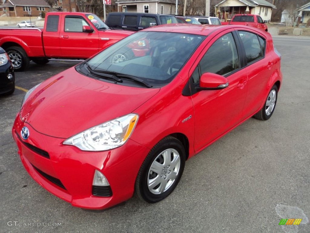 Absolutely Red Toyota Prius c