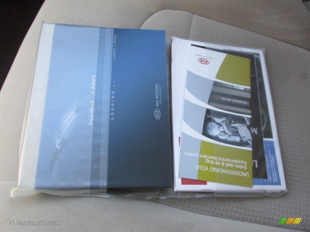 2009 Spectra EX Sedan - Spicy Red Metallic / Beige photo #22
