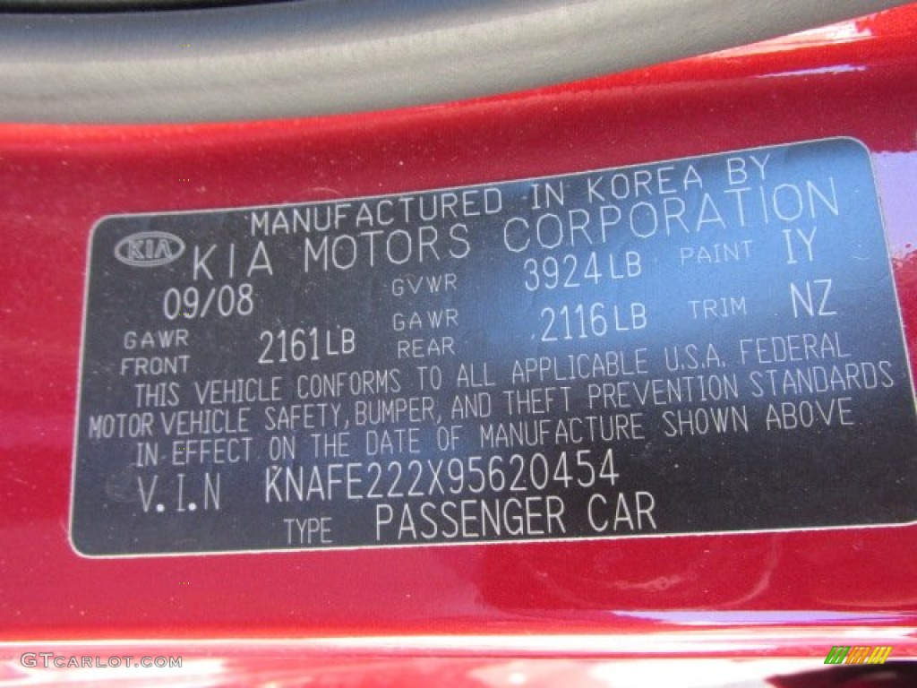 2009 Spectra EX Sedan - Spicy Red Metallic / Beige photo #23