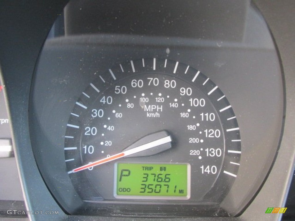 2009 Spectra EX Sedan - Spicy Red Metallic / Beige photo #24