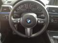 Black 2014 BMW 3 Series 335i Sedan Steering Wheel