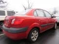 2009 Tropical Red Kia Rio SX Sedan  photo #3