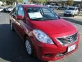 Red Brick 2013 Nissan Versa 1.6 SL Sedan