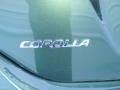 2014 Toyota Corolla LE Badge and Logo Photo