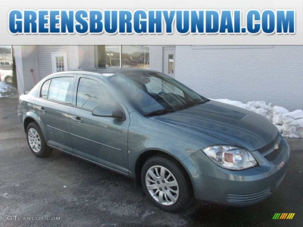 2009 Cobalt LT Sedan - Silver Moss Metallic / Ebony photo #1