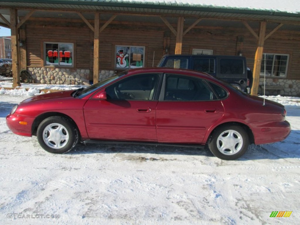 1998 Taurus LX - Toreador Red Metallic / Medium Prairie Tan photo #1