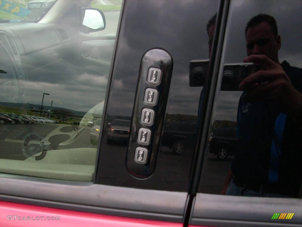 2004 Explorer XLT 4x4 - Redfire Metallic / Medium Parchment photo #14