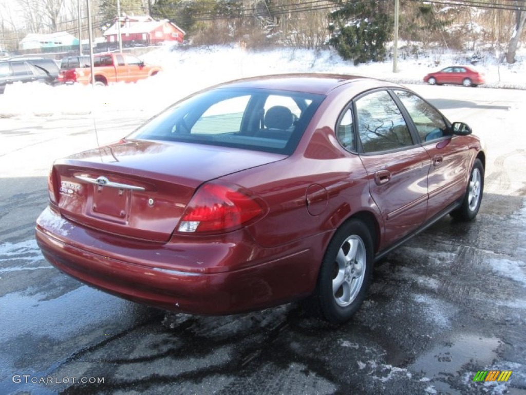 2002 Taurus SE - Matador Red Metallic / Dark Charcoal photo #7