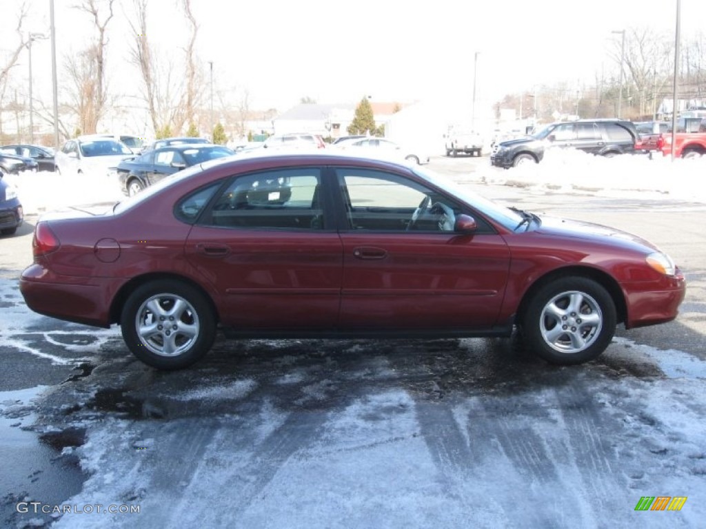 2002 Taurus SE - Matador Red Metallic / Dark Charcoal photo #8