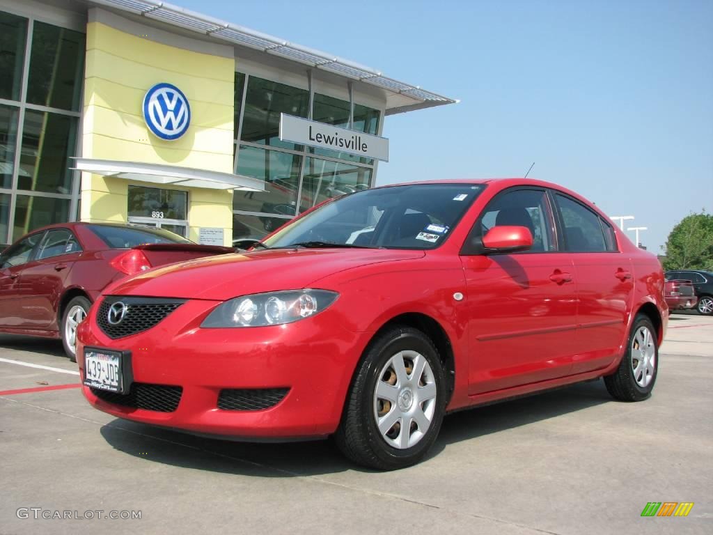 2006 MAZDA3 i Sedan - Velocity Red Mica / Black photo #1