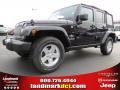 Black 2014 Jeep Wrangler Unlimited Oscar Mike Freedom Edition 4x4
