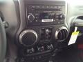 2014 Jeep Wrangler Unlimited Black Interior Controls Photo