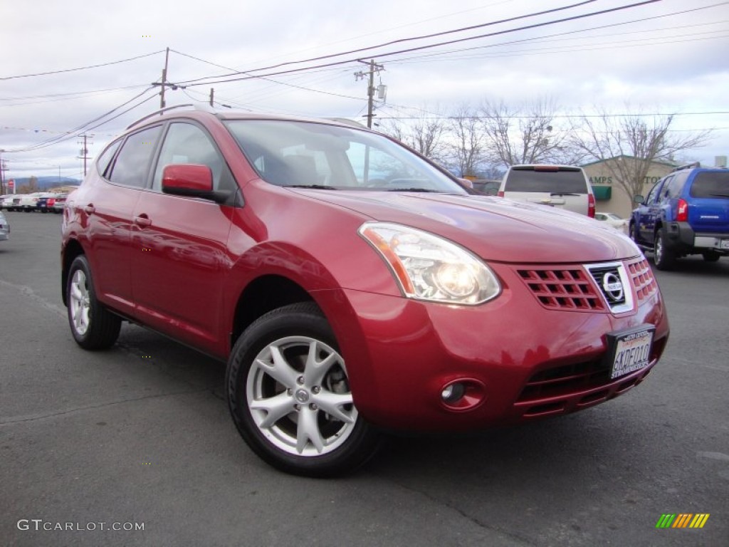 2009 Rogue SL AWD - Venom Red / Black photo #1