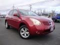 2009 Venom Red Nissan Rogue SL AWD  photo #1